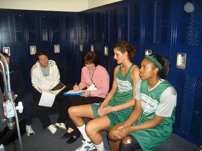 Junior Allyssa DeHaan (right) talks with ESPN's Mary Murphy (center) and Todd Harris (left) during today's media sessions.