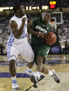Kalin Lucas drives against North Carolina's Ty Lawson in the first half.