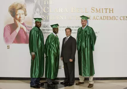 Marquise Gray, Travis Walton and Goran Suton participated in spring commencement exercises.