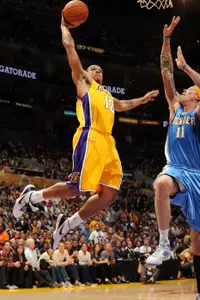 Shannon Brown dunks over Chris Andersen in game five of the NBA's Western Conference Finals. (Photo courtesy of NBA Photos)