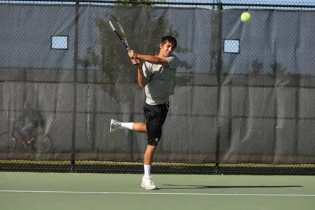 Freshman Denis Bogatov begins fall play advancing in both singles and doubles action.