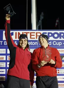 Mickie Rzepka (left) and Shauna Rohbock (right) celebrate after winning a Bobsled World Cup race in Cesana Pariol, northern Italy, Saturday, Dec. 5, 2009.