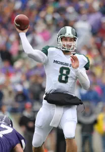 Kirk Cousins completed a career-high 29 passes and threw for 331 yards in the win at Northwestern.