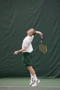 Senior John Stratton and his teammate Austin Brooks earned three victories in doubles play.
