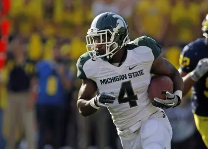 Edwin Baker rushed for 147 yards against Michigan, including a 61-yard TD run in the second quarter.