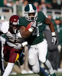 Edwin Baker scored a career-high four touchdowns in MSU's 31-8 win over Minnesota on Saturday.