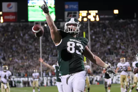 Charlie Gantt celebrates following his game-winning touchdown in overtime against Notre Dame on Sept. 18 in Spartan Stadium.