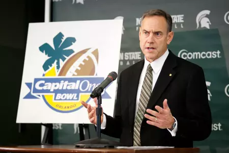 Coach Dantonio speaks to reporters at MSU's Capital One Bowl Media Day on Friday.