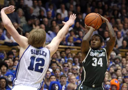Korie Lucious shoots during the first half.