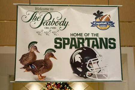 The Spartan football team arrived at The Peabody hotel in Orlando Christmas night.