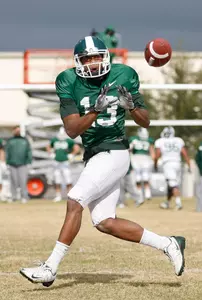 Red-shirt freshman wide receiver Bennie Fowler catches a pass at practice.