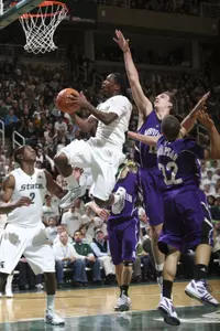 Kalin Lucas leads the Spartans against Wisconsin on Tuesday.