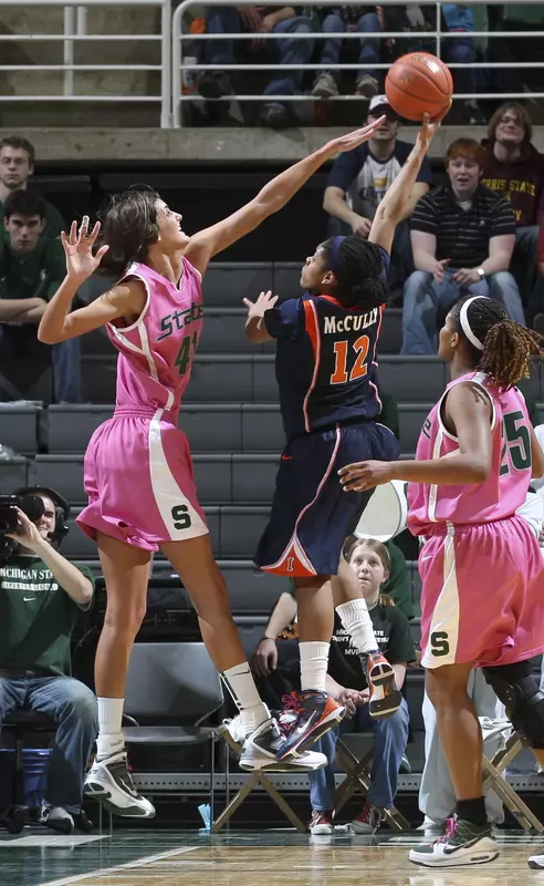 Senior Allyssa DeHaan reaches for her record-setting 487th block on Thursday night.