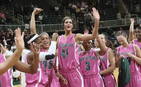 Allyssa DeHaan address the Spartan crowd with her teammates after breaking the NCAA record.