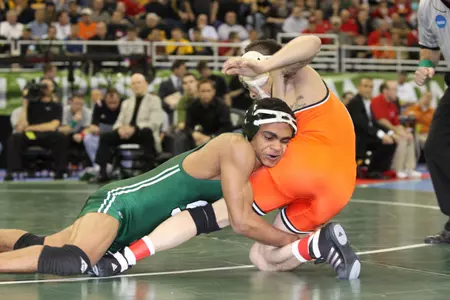 Franklin Gomez takes down Jordan Oliver on Saturday.