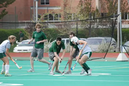 Corey Tropp and A.J. Sturges defend against Jantine Steinmetz