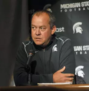 MSU Athletics Director Mark Hollis addresses the media at Sunday's press conference. (Photo by Dale Young, The Detroit News)