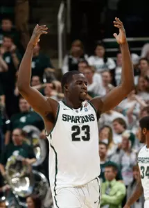 Draymond Green fires up the Spartan fans during the comeback win against Wisconsin.