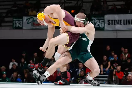 Sean McMurray recorded a fall in the 157-pound match to help lead the Spartans to a 21-15 victory over No. 14 Illinois Sunday at Jenison Field House.