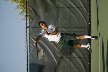 Junior Denis Bogatov advanced in both singles and doubles play.