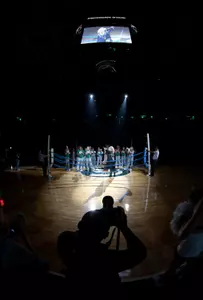 Head coach Suzy Merchant and the Spartans entered to a make-shift boxing ring at midcourt as