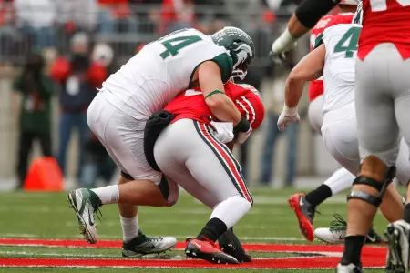 Marcus Rush recorded his first career sack at Ohio State, dropping Joe Bauserman for a 7-yard loss late in the fourth quarter.