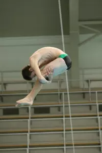 Brian Akers posted a pair of wins on the diving board for the Spartans, Friday night.