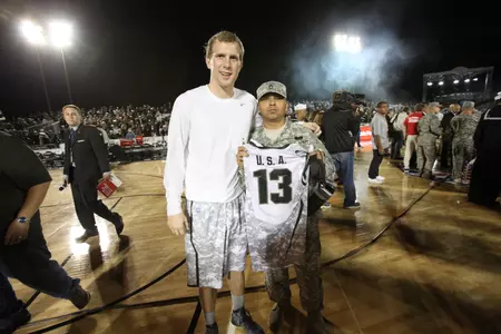 Following the Carrier Classic, Austin Thornton presented his game jersey to a wounded U.S. serviceman.