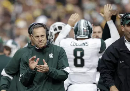 MSU head coach Mark Dantonio smiles after a Spartan touchdown during last Saturday's 37-21 win at Iowa.