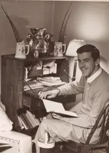 The Old Brass Spittoon appeared as a decoration above Gene McDermott's desk.