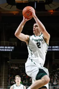 Alex Gauna puts up a shot.