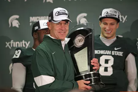 Mark Dantonio and the 2011 captains were presented the Big Ten Legends Division Championship trophy during the postgame press conference.