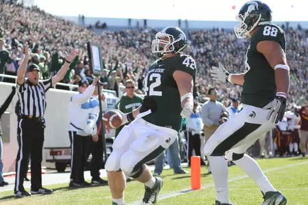 Todd Anderson celebrates after scoring his first career touchdown in the Minnesota game.