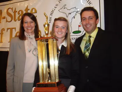 Gabby Yurik (middle) with MSU head coach Stacy Slobodnik-Stoll (left) and assistant coach Lorne Don (right).