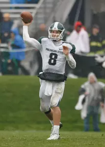 Kirk Cousins became MSU's career leader in TD passes (62) and 200-yard passing games (24) in the Spartans' 31-17 victory at Northwestern.