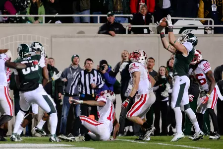 Keith Nichol hauls in the game-winning touchdown catch on a Hail Mary pass as the Spartans defeated Wisconsin on the final play of the game.