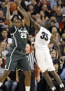 Derrick Nix looks to pass in the first half.