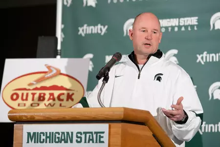 Offensive coordinator Dan Roushar speaks at media day on Tuesday in the Smith Auditorium.