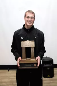 Kirk Cousins with the Lowe's Senior CLASS Award on Thursday in Tampa.