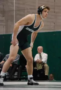 Curran Jacobs won his 21st match of the season Friday night with a 6-5 overtime victory over Nick Avery of Indiana.