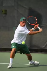 Senior Jason Norville earned an 8-6 victory in doubles play with teammate John Stratton.