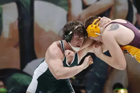 Tyler Dickenson placed fourth in the 197-pound weight class at the 2011 Big Ten Wrestling Championships.