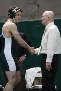 Head coach Tom Minkel and the Spartans will face a tough schedule in 2011-12.