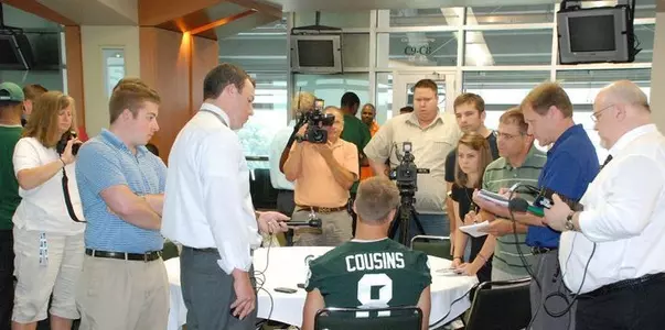 Senior quarterback Kirk Cousins was the center of attention at media day.