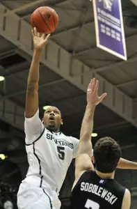 Adreian Payne goes up for a shot.