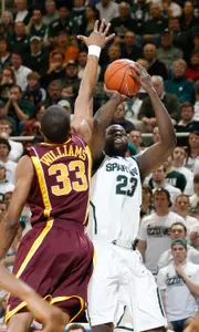 Draymond Green helped lead MSU to a 68-52 win, giving Coach Izzo career victory No. 400.