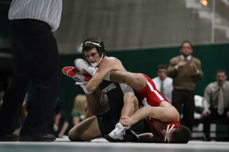 Senior Eric Olanowski recorded a technical fall over Nebraska's Shawn Nagel at 125 pounds on Friday night at Jenison Field House.