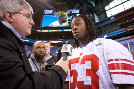 Former Spartan All-American Greg Jones answers questions at Tuesday's Super Bowl Media Day.