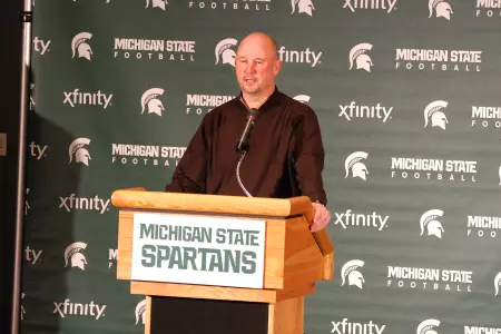 Offensive coordinator Dan Roushar speaks to the media at MSU's Buffalo Wild Wings Bowl Media Day Thursday.