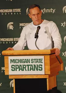 Spartan head coach Mark Dantonio talks to reporters at MSU's Buffalo Wild Wings Bowl Media Day.